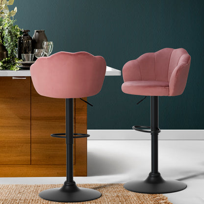 Add a Touch of Modern Style and Comfort to Your Space with Artiss' Nessah Swivel Bar Stools: Set of 2 with Gas Lift, Heavy-Duty Footrest, Soft Padded Seat, and Floor Protectors. Featuring a Stunning Clam Shell Back Design in Pink Velvet Upholstery, Our Modern Bar Stools are Perfect for Any Kitchen or Living Room Decor. Upgrade Your Space Today with Artiss' Nessah Swivel Bar Stools.