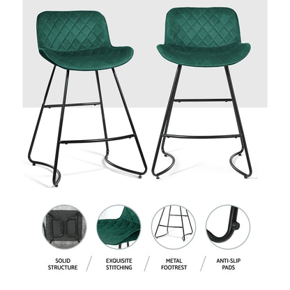 Stylish, Comfortable, and High-Quality. Featuring a sleek modern design with a sturdy steel frame and a heavy-duty footrest, our bar stools offer ultimate stability and support. The smooth and comfortable swivel seat is upholstered with thick foam and fine quality fabric in a stunning green color, making it a perfect addition to any living room, kitchen, or home bar