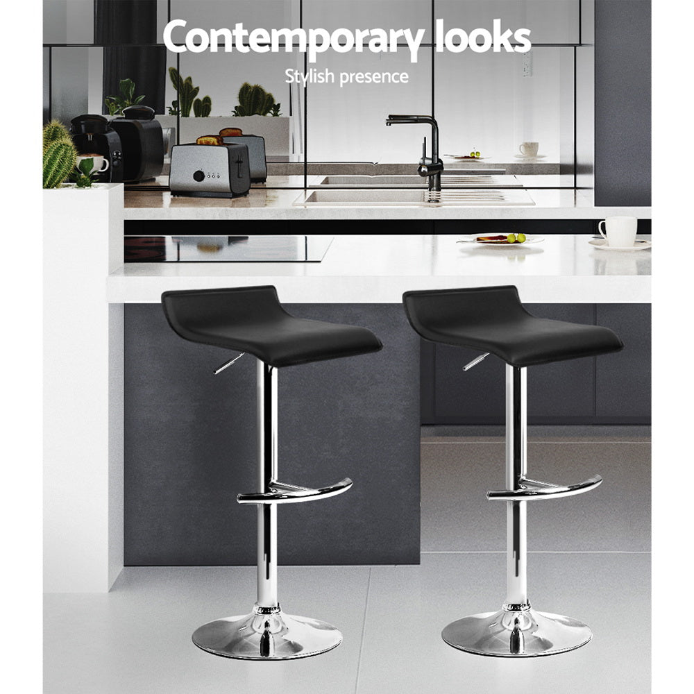 Artiss Set of 2 PU Leather Wave Style Bar Stools - Black  Available in white and black, this bar stool complements your home decor and adds a touch of class to its inherent charisma. 