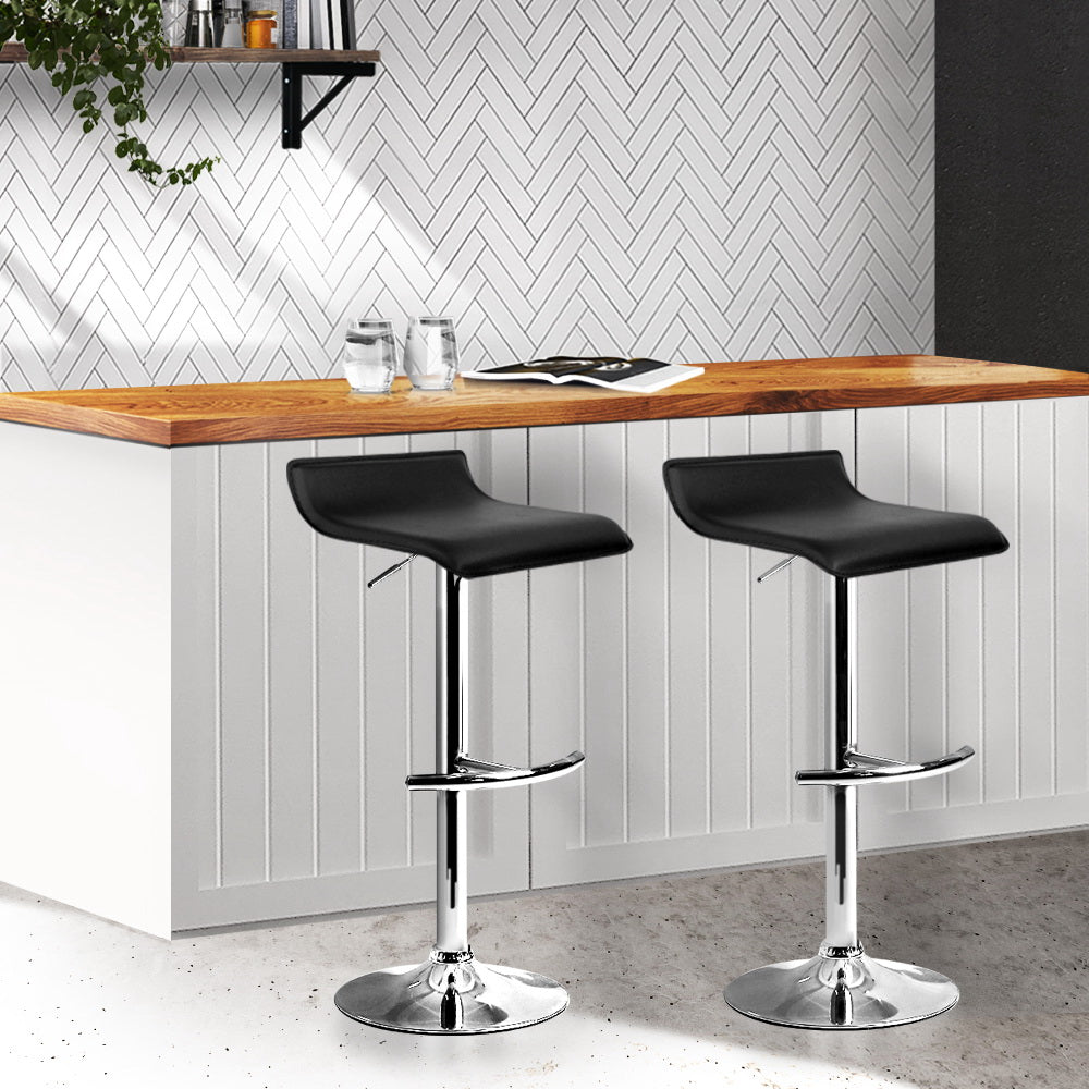 Artiss Set of 2 PU Leather Wave Style Bar Stools - Black  Available in white and black, this bar stool complements your home decor and adds a touch of class to its inherent charisma. 