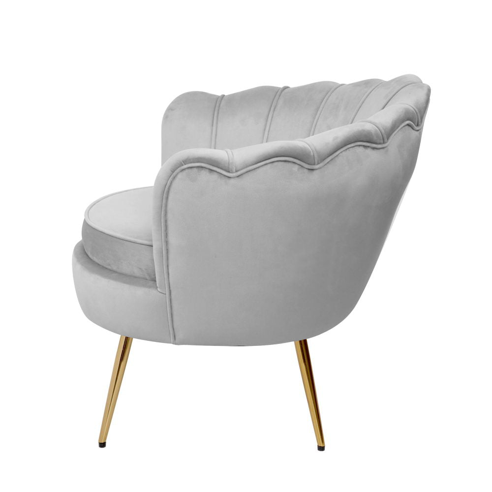 Grey Barrel sofa chair with scalloped back, upholstered vanity chair featuring a lotus flower design. A stylish and unique addition to your space