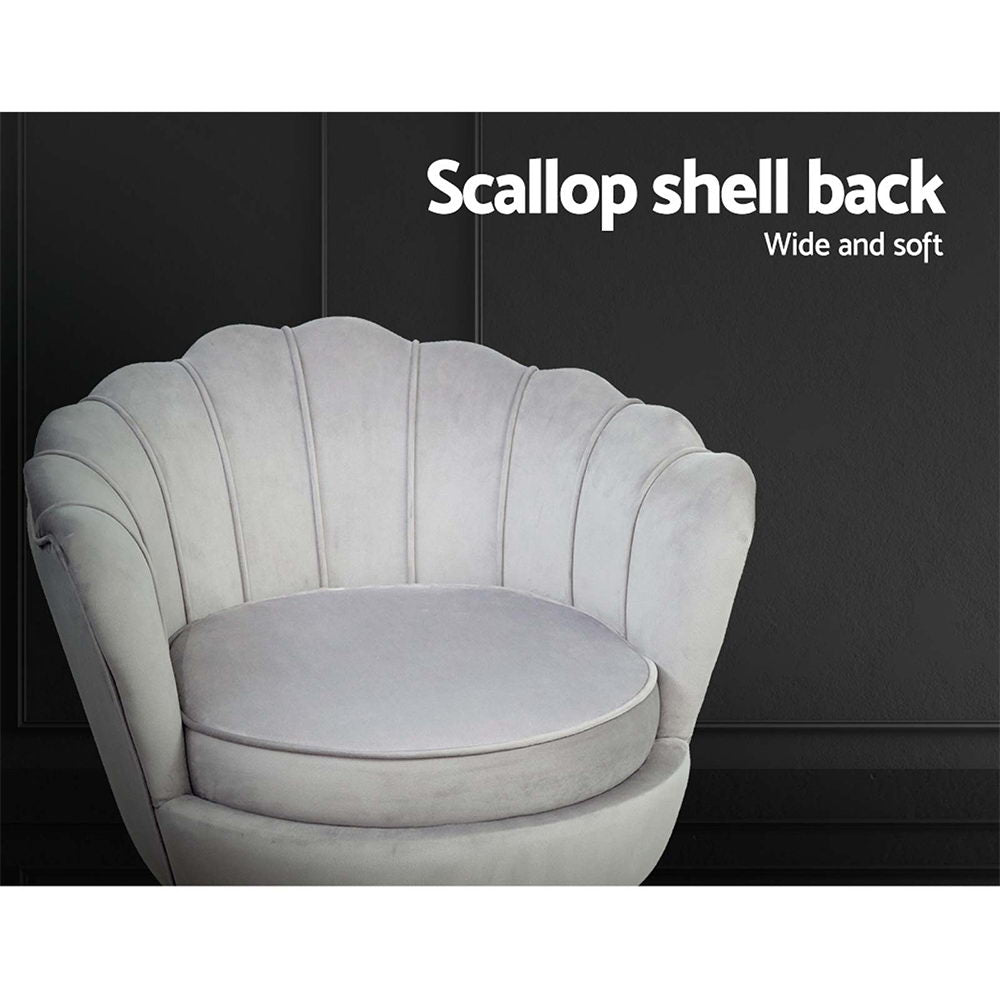 Scalloped shell back design for a wide and soft seat. Elevate your space with comfort and style in this unique and luxurious chair