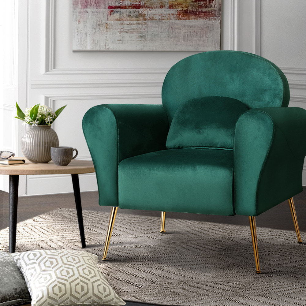 Enhance your living room with this elegant Green Velvet accent Arm chair. Stylish design, rolled armrests, and golden legs create a cozy and luxurious atmosphere.